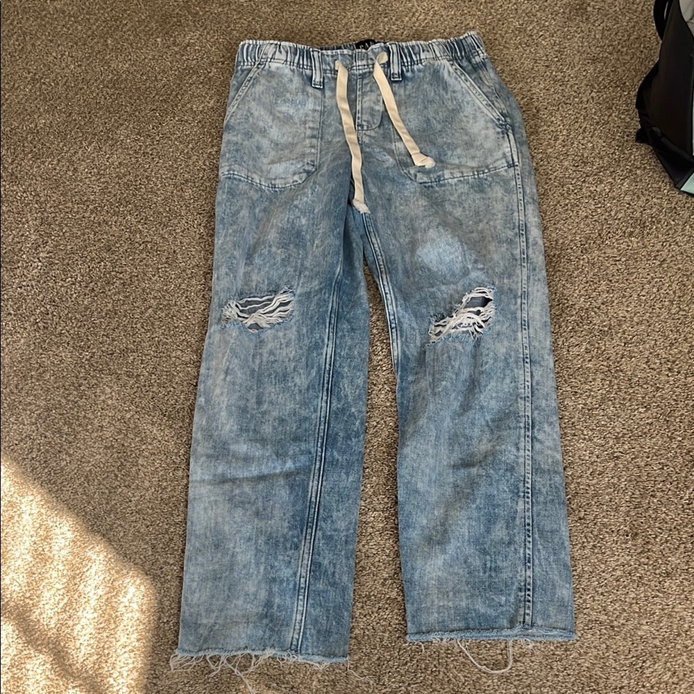 Distressed Light Wash Blue Jeans